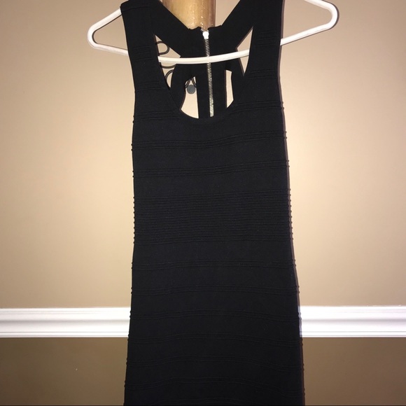 WOW couture Dresses & Skirts - Wow says simple black dress with cris cross back